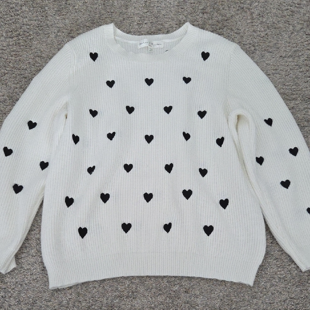Chelsea & Theodore White Sweater with Black Heart Design